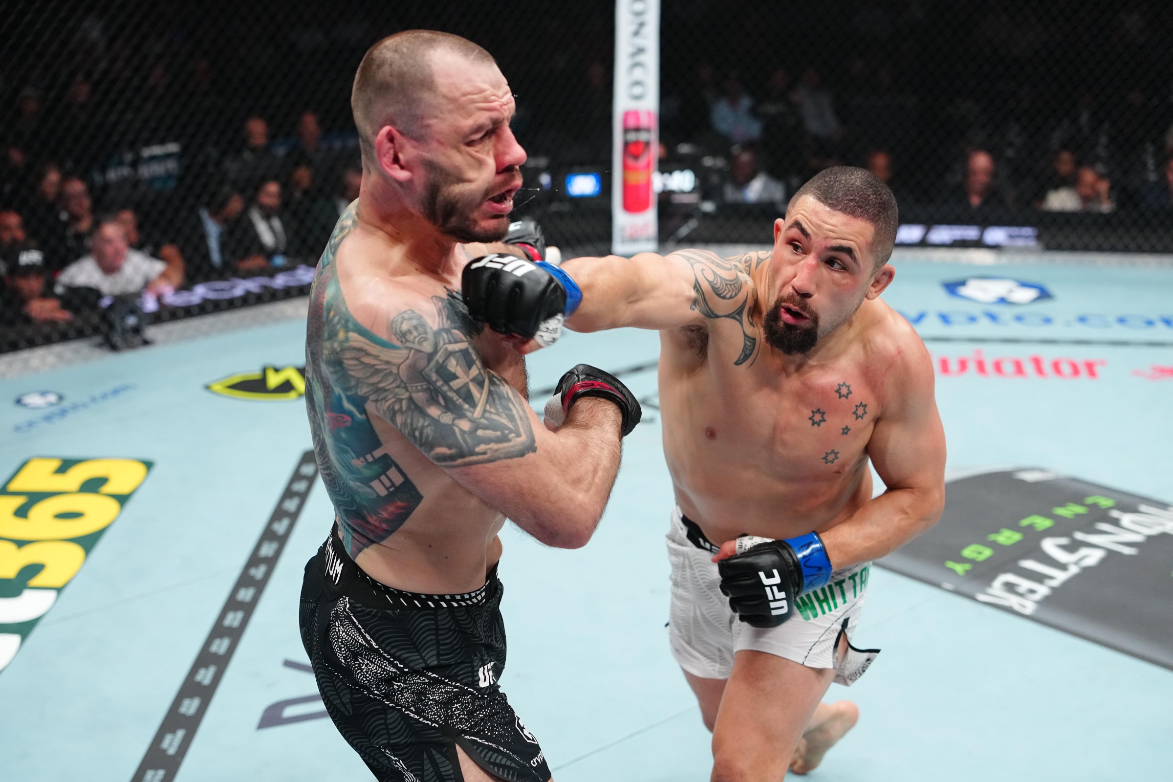 LAS VEGAS, NEVADA - JULY 11: (R-L) Robert Whittaker of New Zealand strikes Nikita Krylov of Ukraine in a light heavyweight fight during the UFC 329 event at T-Mobile Arena on July 11, 2026 in Las Vegas, Nevada. (Photo by Jeff Bottari/Zuffa LLC)
