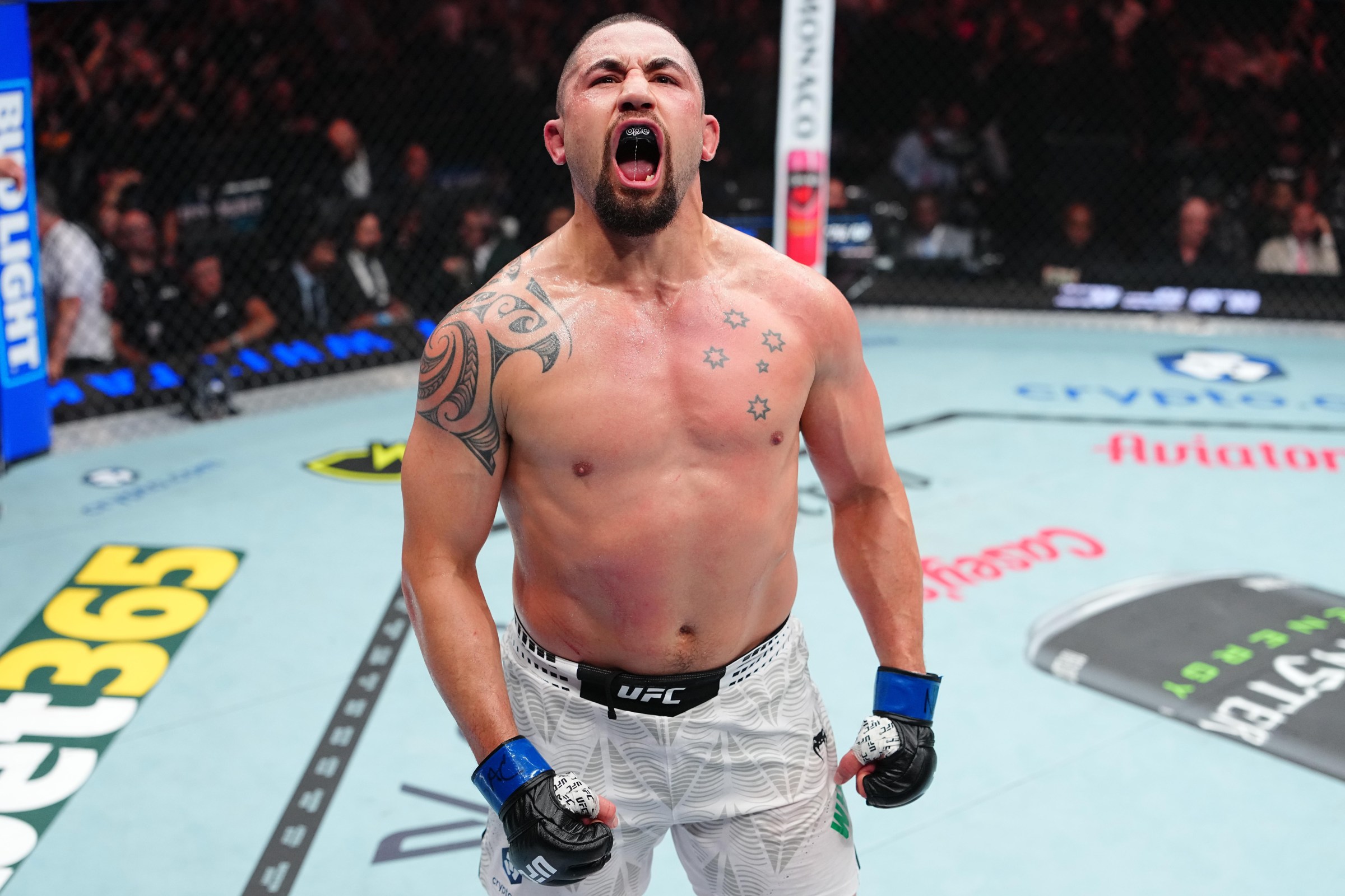 LAS VEGAS, NEVADA - JULY 11: Robert Whittaker of New Zealand celebrates after defeating Nikita Krylov of Ukraine in a light heavyweight fight during the UFC 329 event at T-Mobile Arena on July 11, 2026 in Las Vegas, Nevada. (Photo by Jeff Bottari/Zuffa LLC)