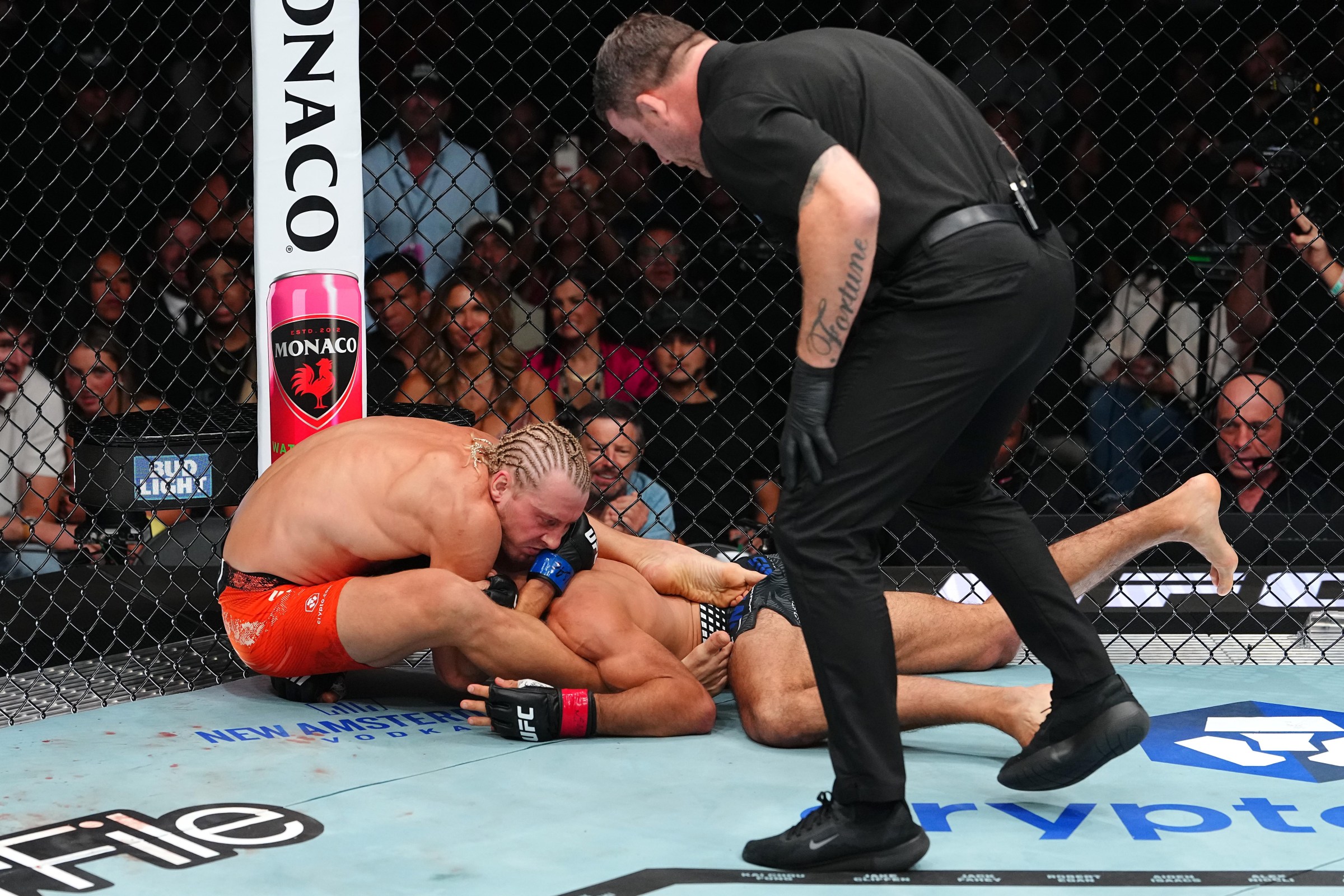 LAS VEGAS, NEVADA - JULY 11: (L-R) Paddy Pimblett of England wrestles Benoit Saint Denis of France in a lightweight fight during the UFC 329 event at T-Mobile Arena on July 11, 2026 in Las Vegas, Nevada. (Photo by Jeff Bottari/Zuffa LLC)