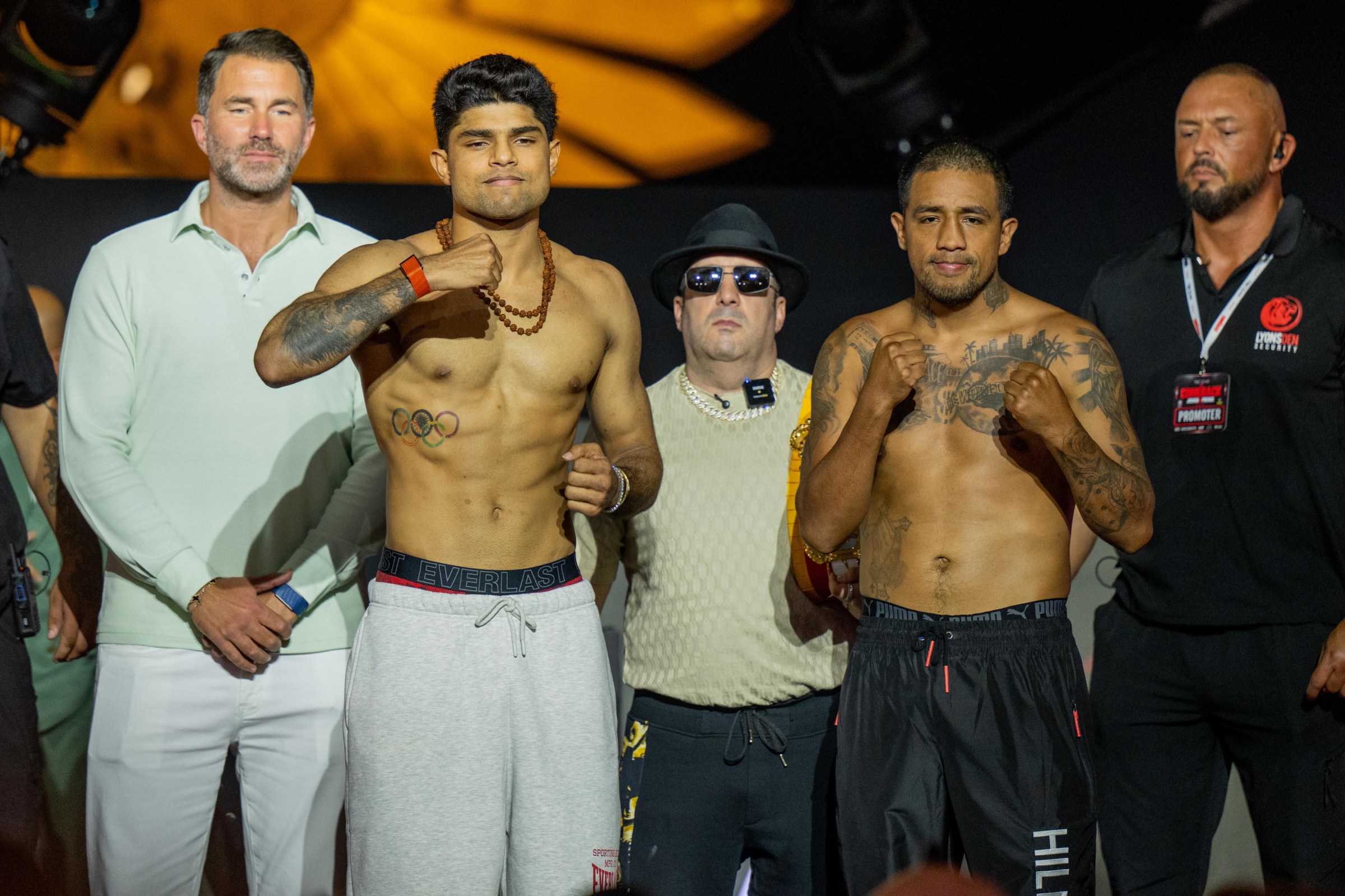 JEDDAH, SAUDI ARABIA - JULY 24: Nishant Dev (L) and Cesar Diaz (R) gesture to the crowd after weighing in during the Anthony Joshua v Kristian Prenga: The Comeback weigh in at Jeddah Promenade on July 24, 2026 in Jeddah, Saudi Arabia. (Photo by Khalid Alhaj/MB Media/Getty Images)