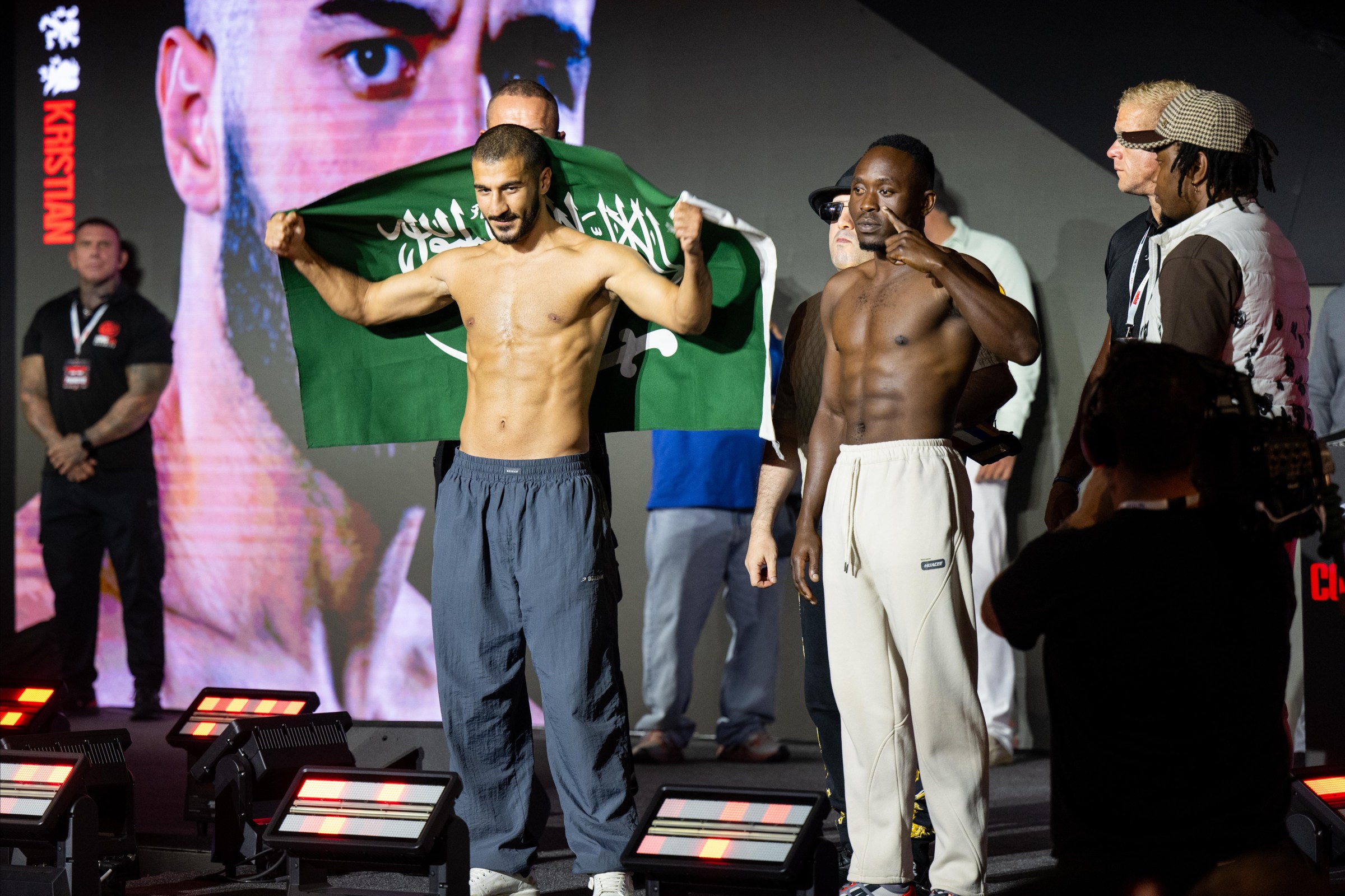 JEDDAH, SAUDI ARABIA - JULY 24: Ziyad Almaayouf (L) and Frank Lucian Mango (R) gesture to the crowd after weighing in during the Anthony Joshua v Kristian Prenga: The Comeback weigh in at Jeddah Promenade on July 24, 2026 in Jeddah, Saudi Arabia. (Photo by Khalid Alhaj/MB Media/Getty Images)