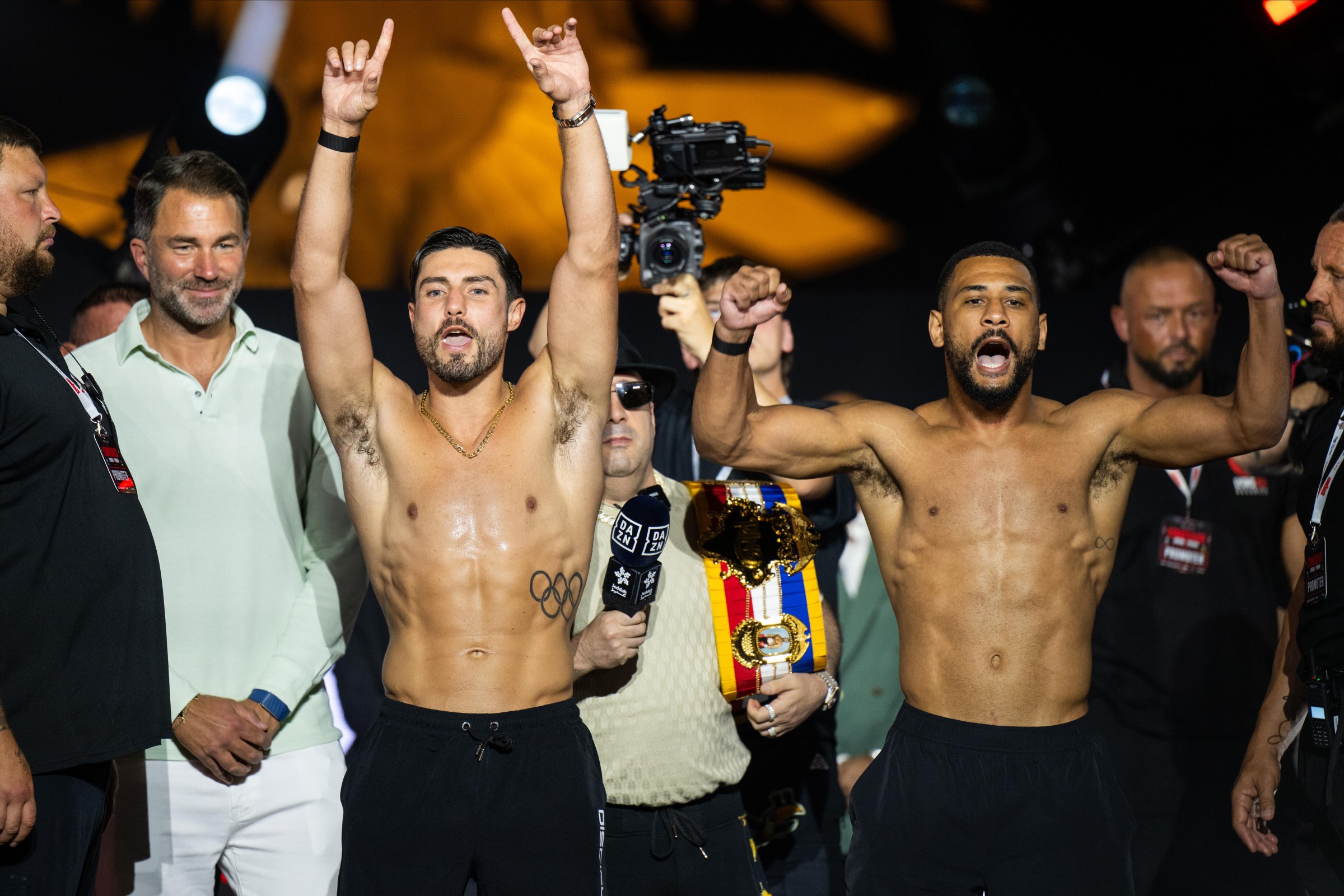 JEDDAH, SAUDI ARABIA - JULY 24: Josh Kelly (L) and Caoimhin Agyarko (R) gesture to the crowd after weighing in during the Anthony Joshua v Kristian Prenga: The Comeback weigh in at Jeddah Promenade on July 24, 2026 in Jeddah, Saudi Arabia. (Photo by Khalid Alhaj/MB Media/Getty Images)