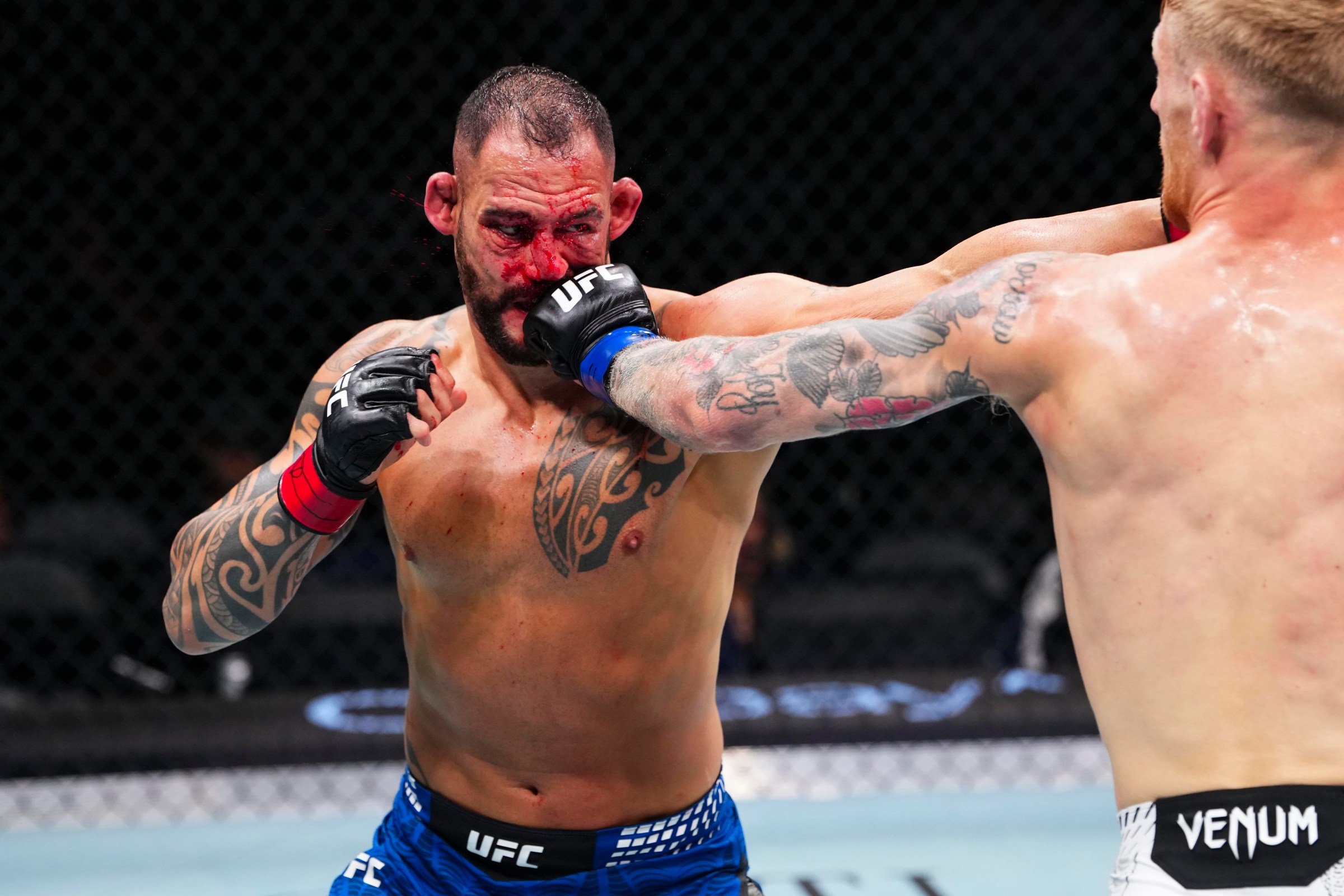 ABU DHABI, UNITED ARAB EMIRATES - JULY 24: Santiago Ponzinibbio throws a punch against Sam Patterson in their welterweight fight during the UFC Fight Night event at Etihad Arena July 24, 2026 in Yas Island, Abu Dhabi, United Arab Emirates. (Photo by Josh Hedges/Zuffa LLC via Getty Images)