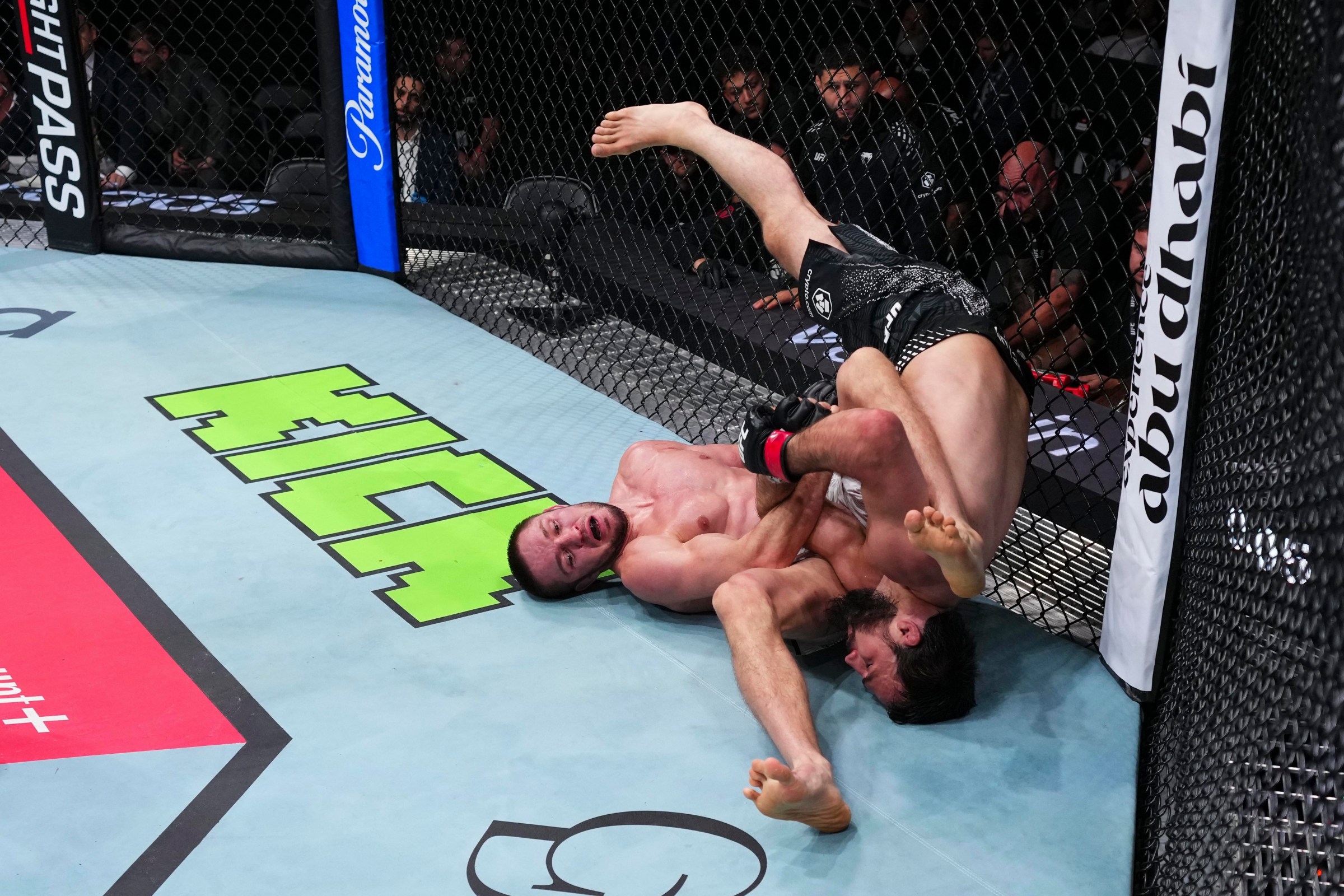 ABU DHABI, UNITED ARAB EMIRATES - JULY 24: Saygid Izagakhmaev grapples with Abubakar Vagaev in their welterweight fight during the UFC Fight Night event at Etihad Arena July 24, 2026 in Yas Island, Abu Dhabi, United Arab Emirates. (Photo by Josh Hedges/Zuffa LLC via Getty Images)