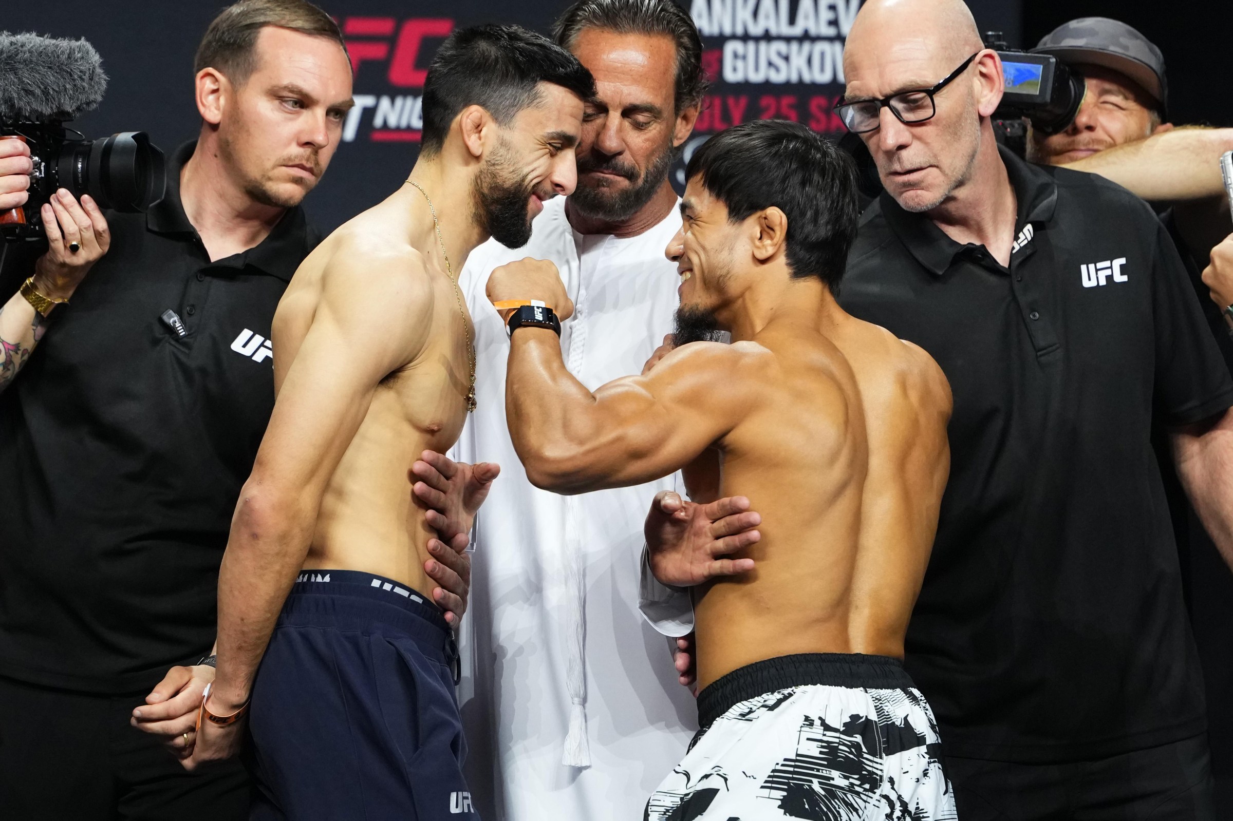 ABU DHABI, UNITED ARAB EMIRATES - JULY 24: (L-R) Opponents Steve Erceg of Australia and Ramazan Temirov of Uzbekistan face off during the UFC Fight Night ceremonial weigh-in at Etihad Arena on July 24, 2026 in Abu Dhabi, United Arab Emirates. (Photo by Josh Hedges/Zuffa LLC)