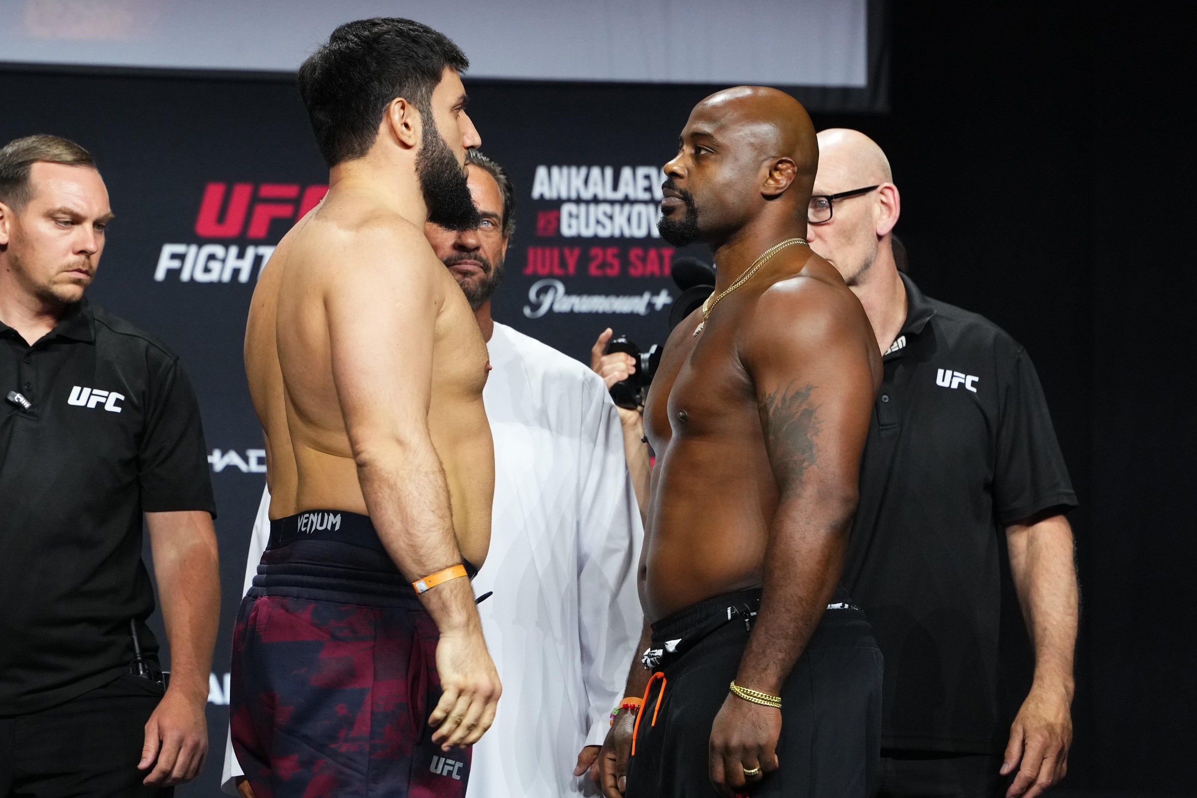 ABU DHABI, UNITED ARAB EMIRATES - JULY 24: (L-R) Opponents Rizvan Kuniev of Russia and Tyrell Fortune face off during the UFC Fight Night ceremonial weigh-in at Etihad Arena on July 24, 2026 in Abu Dhabi, United Arab Emirates. (Photo by Josh Hedges/Zuffa LLC)