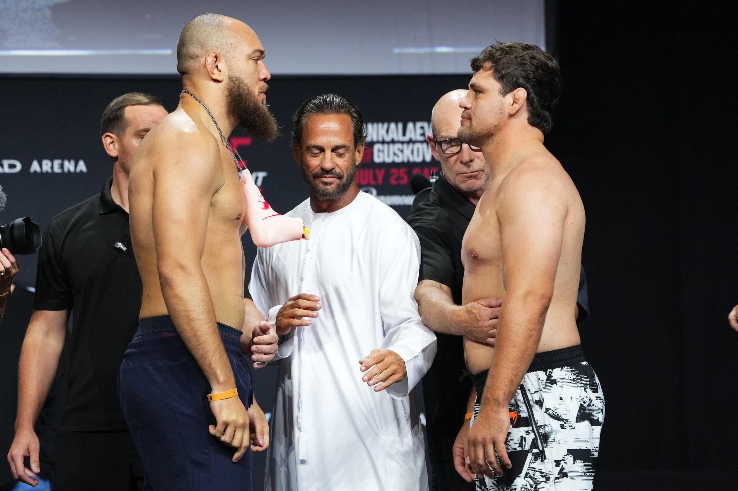 ABU DHABI, UNITED ARAB EMIRATES - JULY 24: (L-R) Opponents Valter Walker of Brazil and Thomas Petersen face off during the UFC Fight Night ceremonial weigh-in at Etihad Arena on July 24, 2026 in Abu Dhabi, United Arab Emirates. (Photo by Josh Hedges/Zuffa LLC)