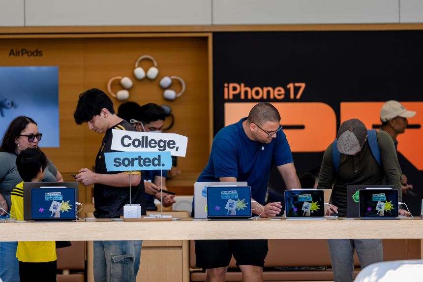 College signage near laptops inside an Apple store in San Francisco, California, on July 28, 2026. Apple Inc. is scheduled to release earnings figures on July 30.