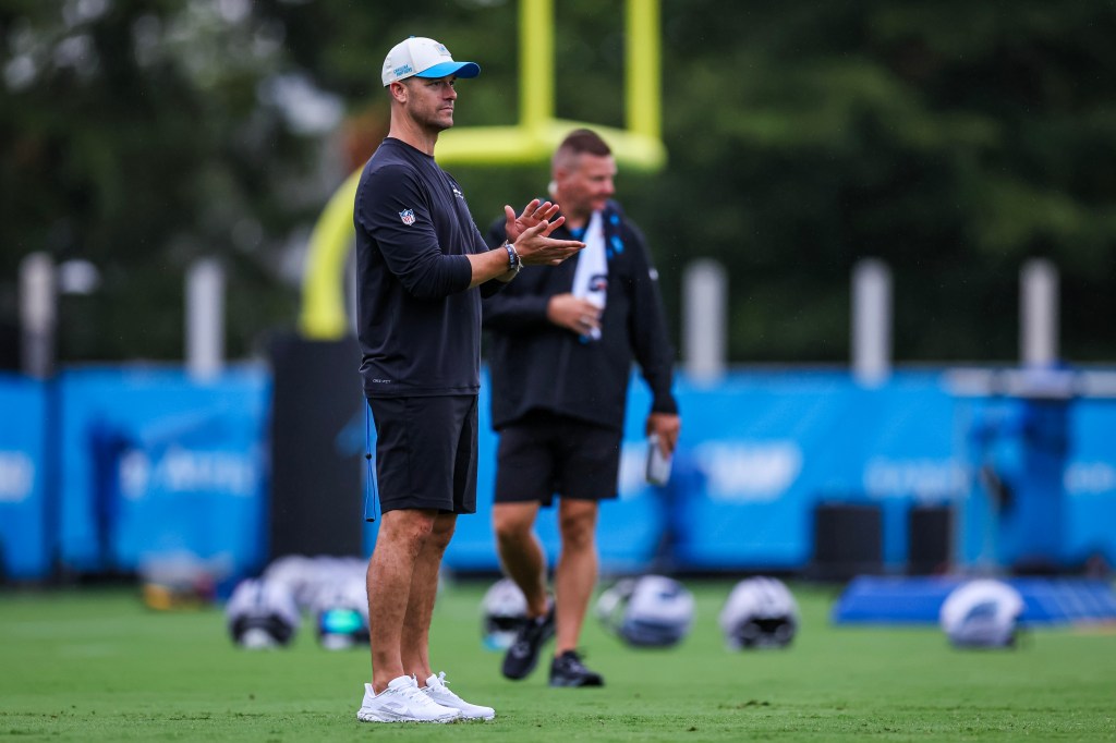 Carolina Panthers Head Coach Dave Canales looks on at training camp.
