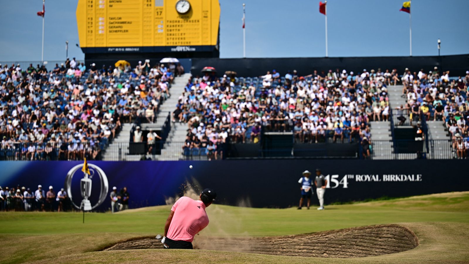 Michael Thorbjornsen hits a bunker shot