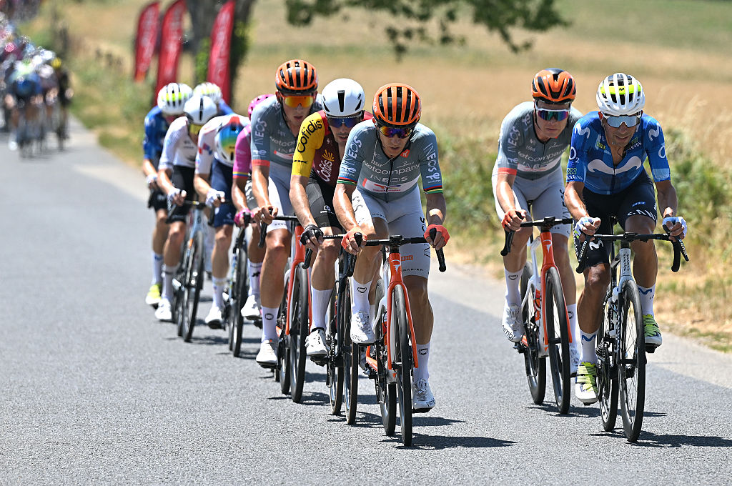 LE LIORAN, FRANCE - JULY 14: (L-R) Ion Izagirre of Spain and Team Cofidis, Michal Kwiatkowski of Poland and Netcompany INEOS Cycling Team and Nelson Oliveira of Portugal and Team Movistar compete during the 113th Tour de France 2026, Stage 10 a 166.6km stage from Aurillac to Le Lioran 1240m / #UCIWT / on July 14, 2026 in Le Lioran, France. (Photo by Dario Belingheri/Getty Images)