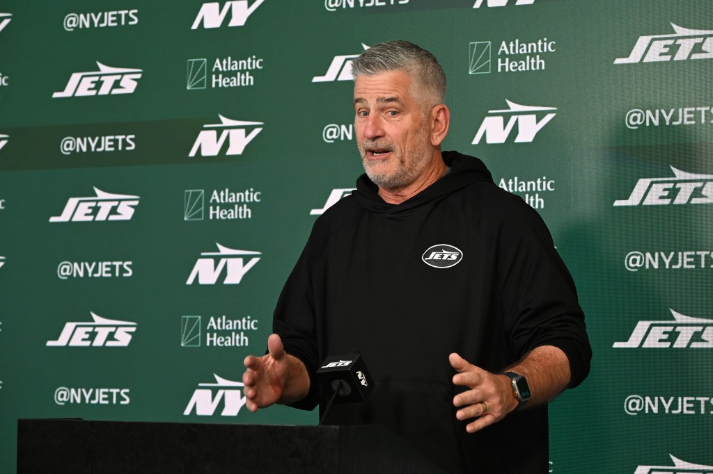 Jets offfensive coordinator Frank Reich talks to the media before practice at minicamp in Florham Park, N.J.
