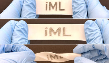 Three photos show a rectangular material being stretched and twisted by gloved hands.