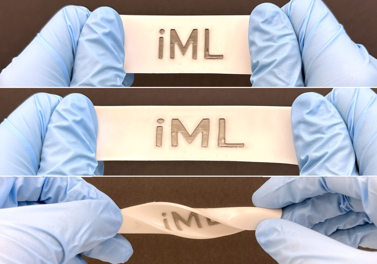 Three photos show a rectangular material being stretched and twisted by gloved hands.