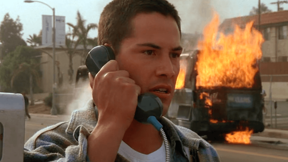 Keanu Reeves as LAPD officer Jack Traven in the 1994 action thriller Speed