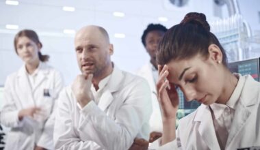laboratory workers looking disappointed