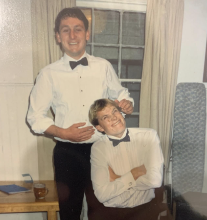 The duo in white tux shirts when they were young.