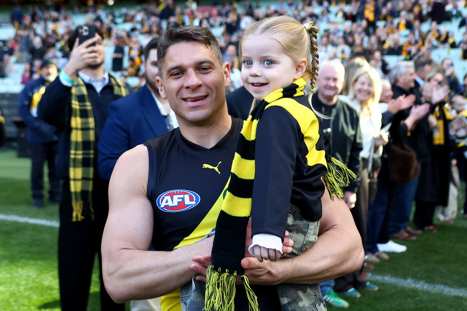 Dion Prestia runs out ahead of his 250th career match.