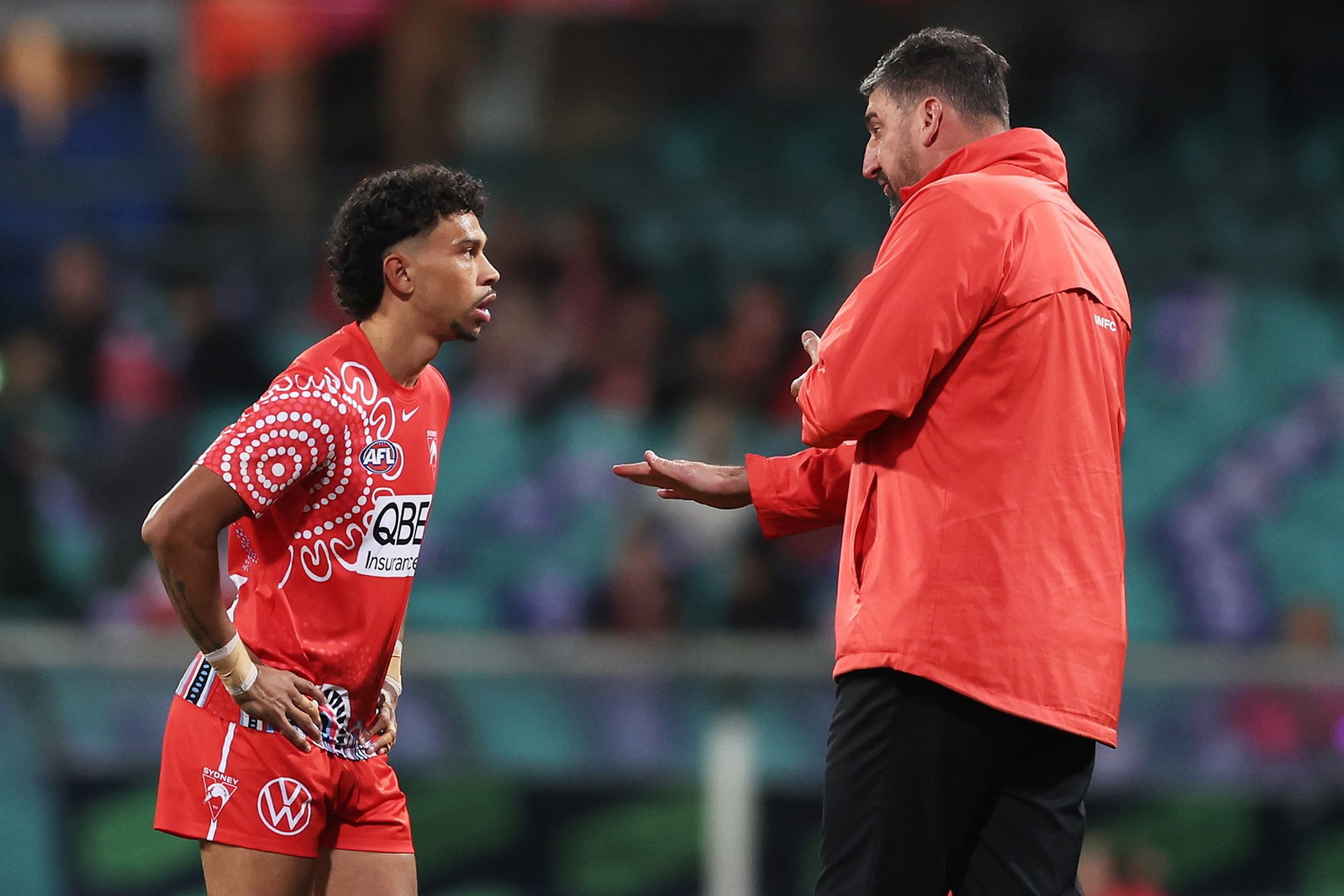 Malcolm Rosas of the Swans talks to Swans head coach Dean Cox at warm up during the round 19 AFL match between Sydney Swans and Adelaide Crows at Sydney Cricket Ground, on July 17, 2026, in Sydney.