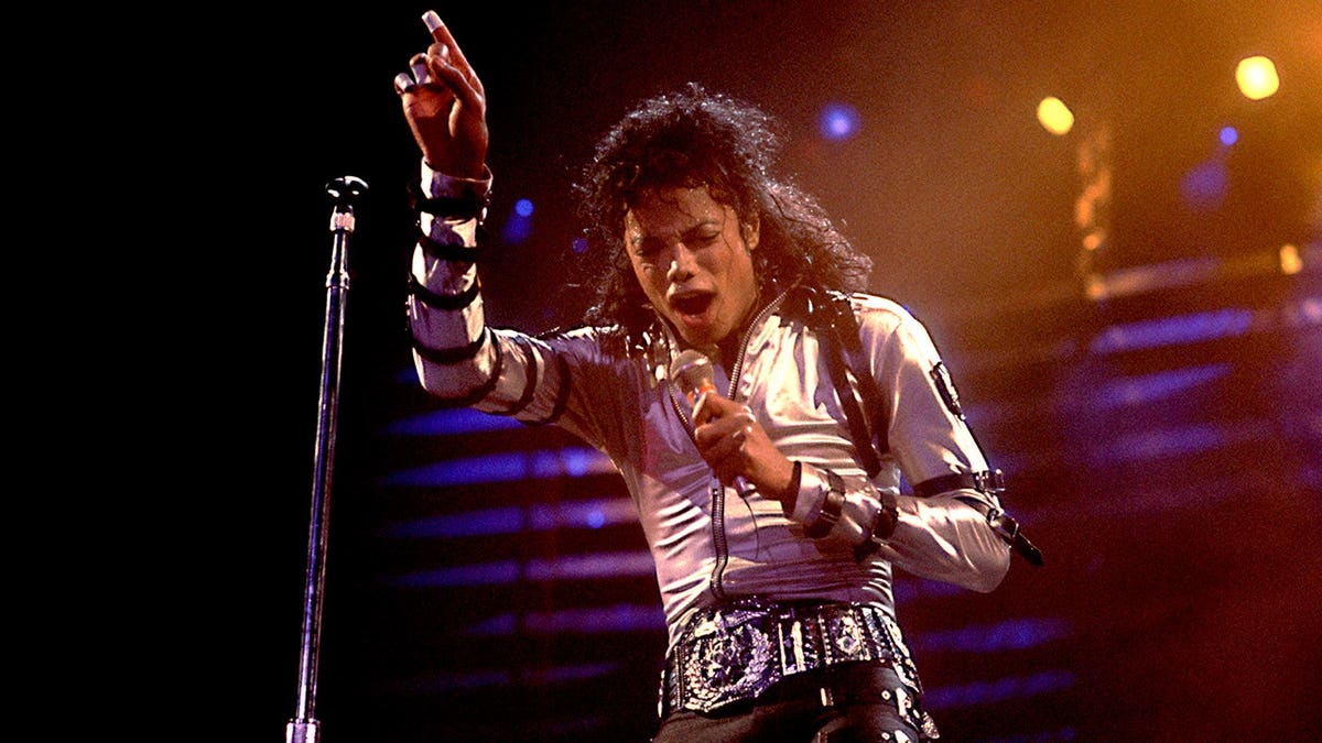 Michael Jackson performs onstage during his Bad tour at the Rosemont Horizon.