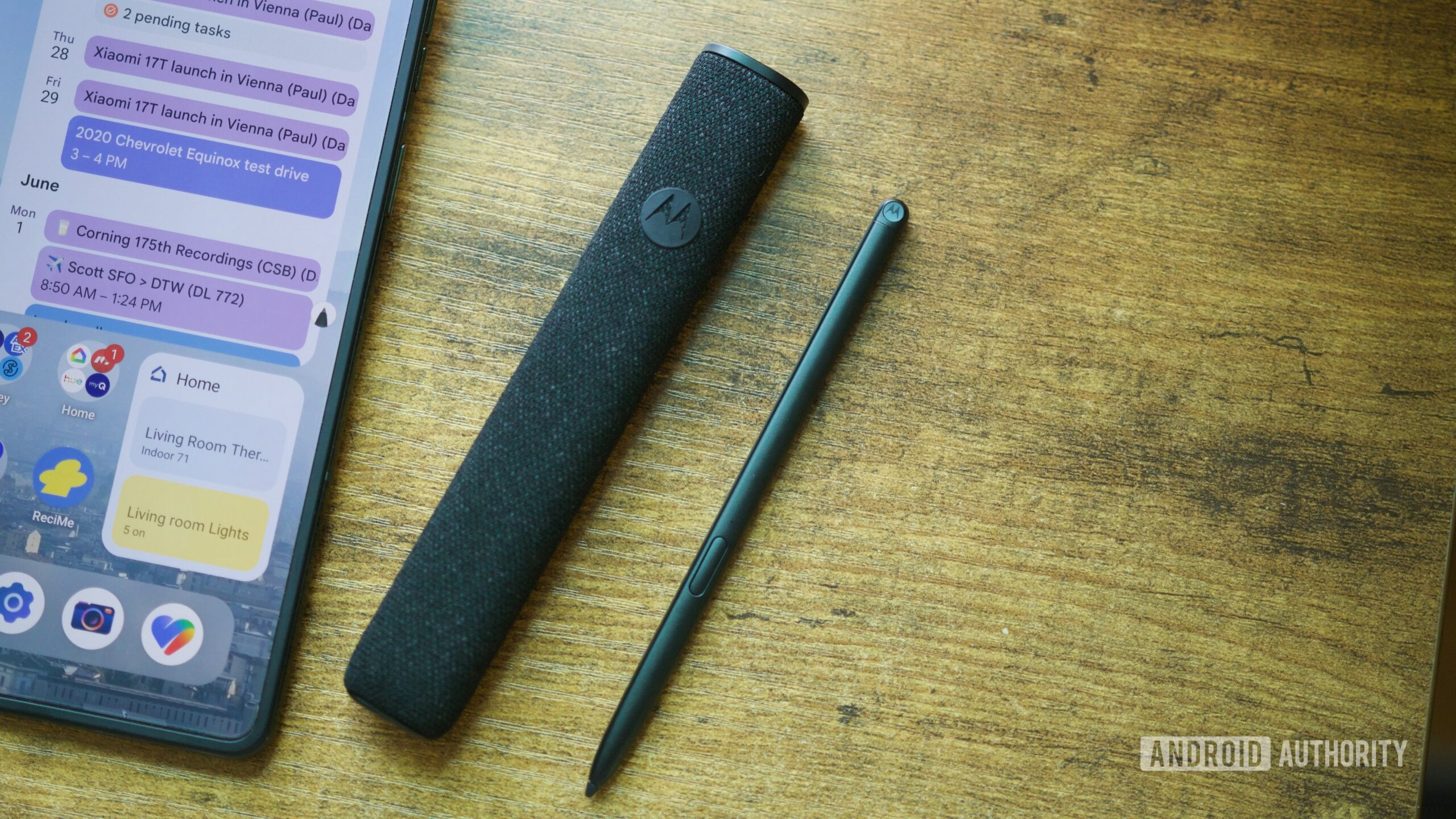 motorola razr fold review moto pen ultra 2 Moto Pen Ultra and its included charging case.