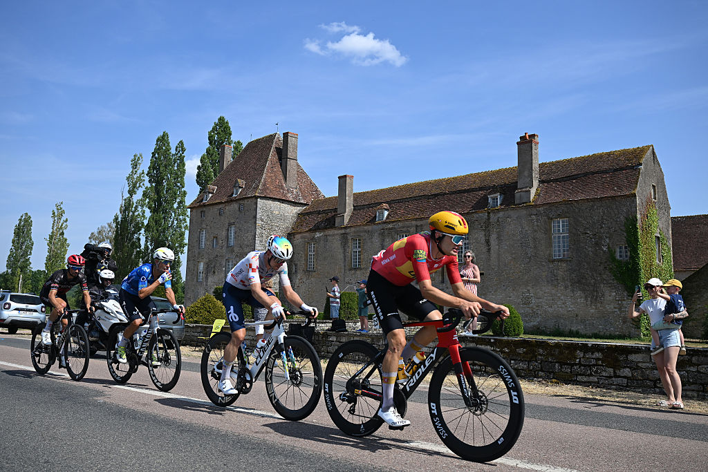 NEVERS, FRANCE - JULY 15: (L-R) Julian Alaphilippe of France and Team Tudor Pro Cycling, Nelson Oliveira of Portugal and Team Movistar, Mathis Le Berre of France and Team TotalEnergies and Anthon Charmig of Denmark and Team Uno-X Mobility compete in the breakaway during the 113th Tour de France 2026, Stage 11 a 161.3km stage from Vichy to Nevers / #UCIWT / on July 15, 2026 in Nevers, France. (Photo by Tim de Waele/Getty Images)