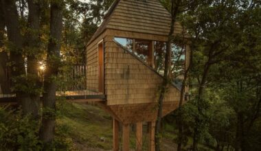 officina82 reimagines traditional italian hay barn as timber treetop retreat in ligurian alps