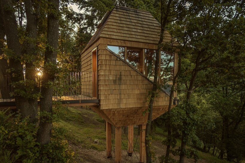 officina82 reimagines traditional italian hay barn as timber treetop retreat in ligurian alps - 1