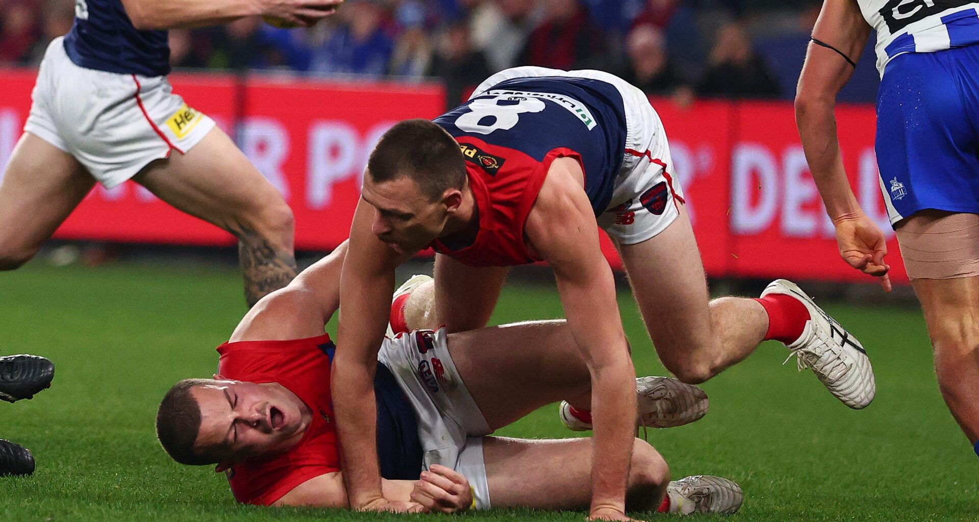Demons defender sent to hospital after injury blow, Roos lament fadeout