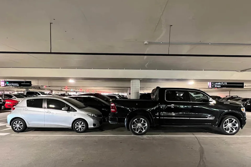 A black Ram truck taking up too much space at the Chadstone shopping centre carpark in Melbourne.