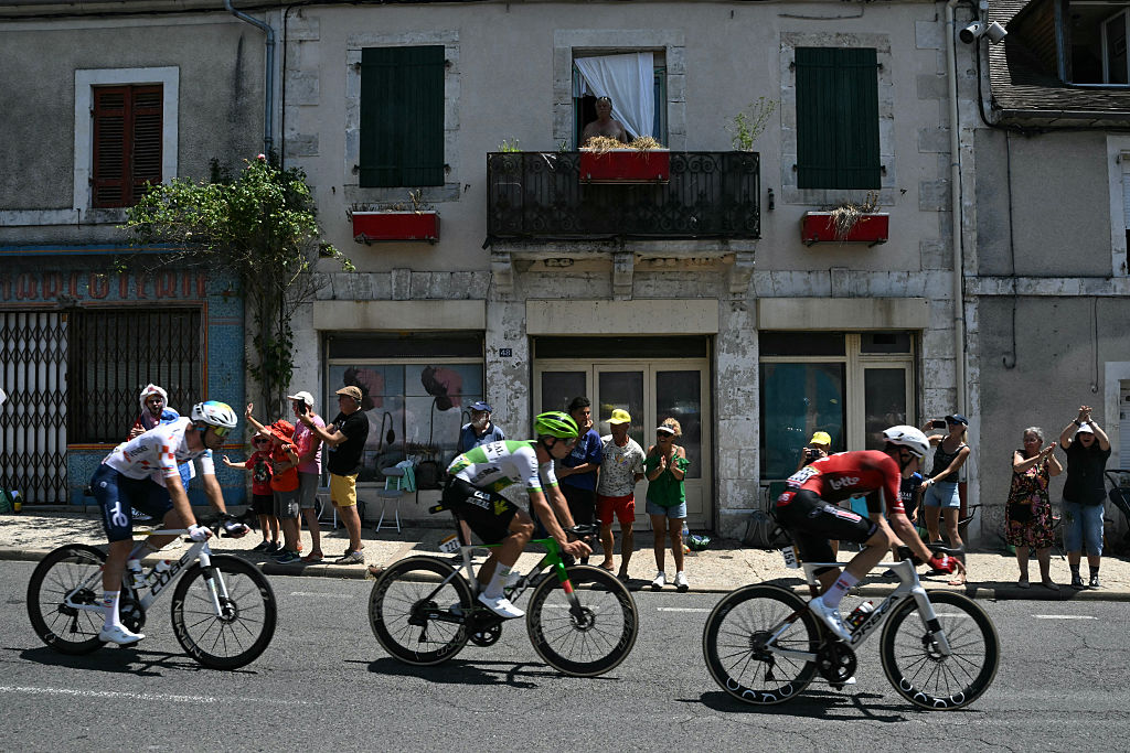 TotalEnergies team's French rider Thibault Guernalec, Caja Rural - Seguros RGA team's Czech rider Jakub Otruba and Lotto Intermarch&eacute; team's Belgian rider Liam Slock cycle in a breakaway during the 8th stage of the 113th edition of the Tour de France cycling race, 180,4 km between Perigueux and Bergerac in southwestern France, on July 11, 2026. (Photo by Jeff PACHOUD / AFP)