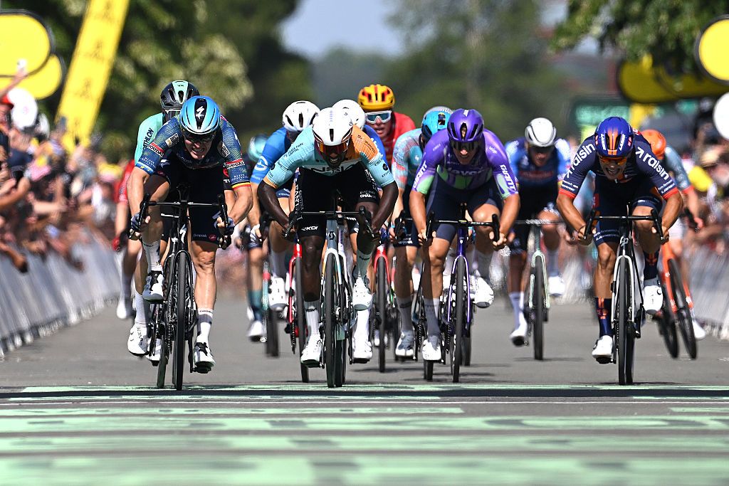 Tim Merlier of Belgium and Biniam Girmay sprint to the finish line during the 113th Tour de France 2026, Stage 8