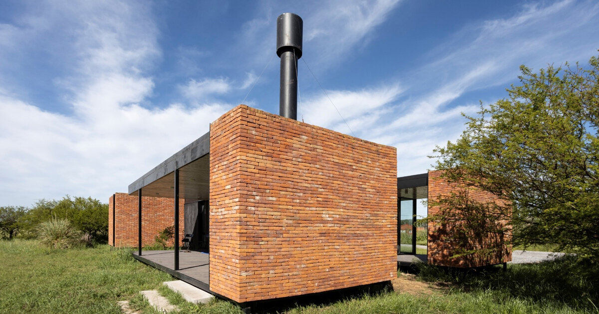 brick skin wraps weekend house with open courtyards in argentina