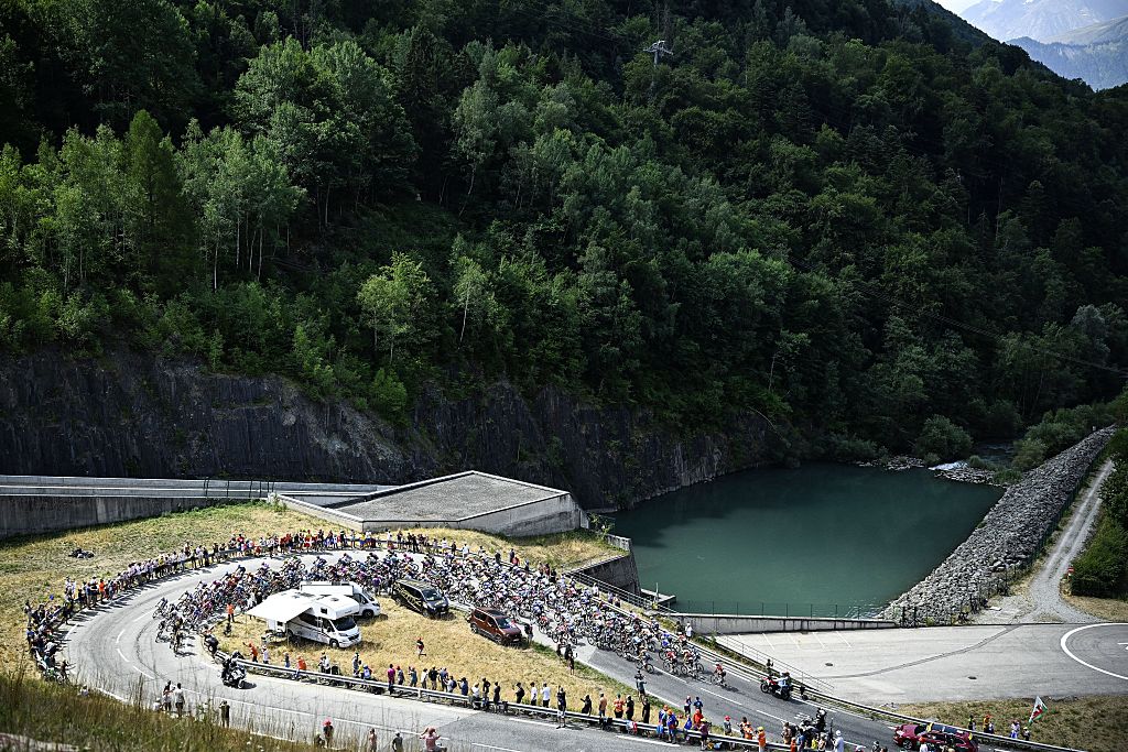 The peloton pictured at the start of stage 20 of the 2026 Tour de France cycling race, a stage of 171km Le Bourg d'Oisans to Alpe d'Huez, on Saturday 25 July 2026. The 113th edition of the Tour de France starts on Saturday 4 July in Barcelona, Spain, and will finish in Paris, France on the 26th of July. BELGA PHOTO JASPER JACOBS (Photo by JASPER JACOBS / BELGA MAG / Belga via AFP)