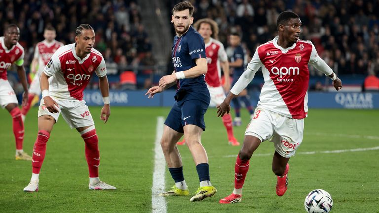 Khvicha Kvaratskhelia of PSG between Thilo Kehrer and Aladji Bamba of Monaco during the Ligue 1 match in March 2026