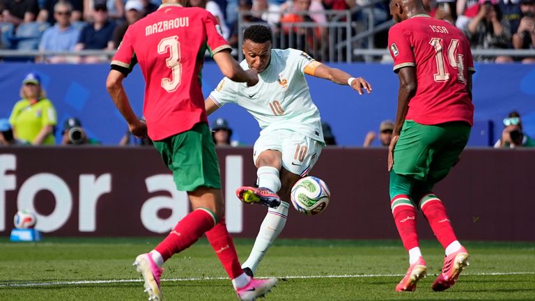 France's Kylian Mbappe scores the opening goal during the World Cup quarter-final against Morocco