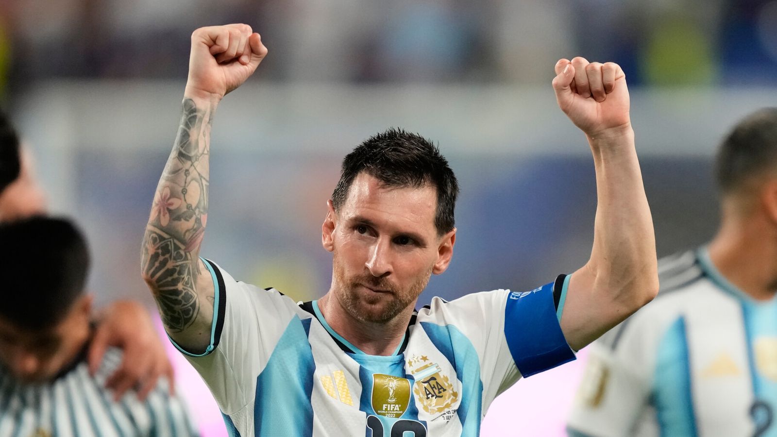 Argentina's Lionel Messi, center, celebrates after the World Cup round of 32 win against Cape Verde