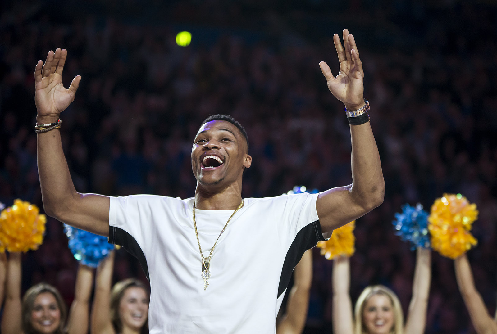 Former UCLA guard Russell Westbrook smiles and opens his arms up to a crowd. Westbrook last played for the Sacramento Kings and is currently an NBA free agent. (Daily Bruin file photo)