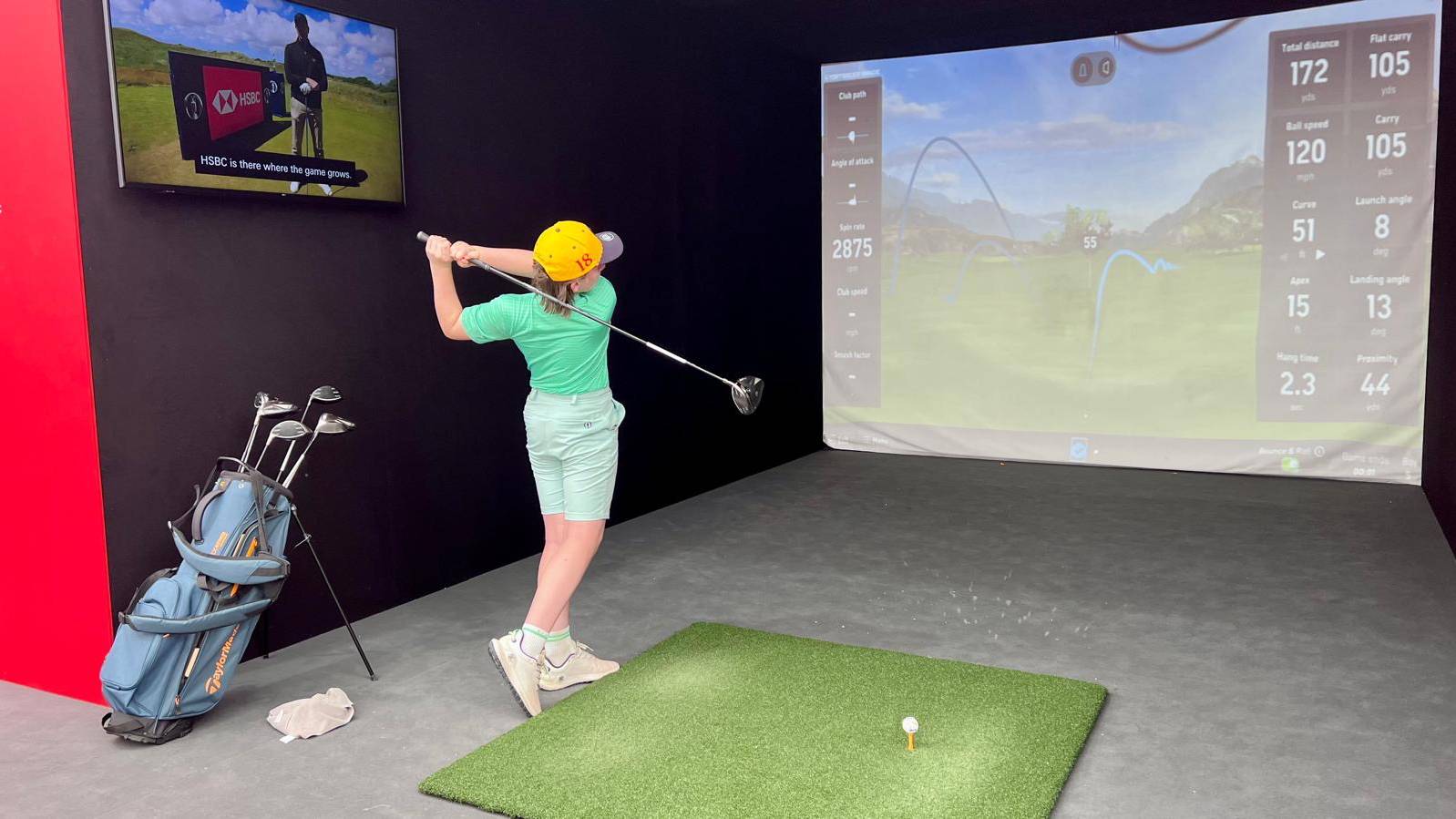 Junior golfer Hogan hitting into a simulator at the Open Championship 2026