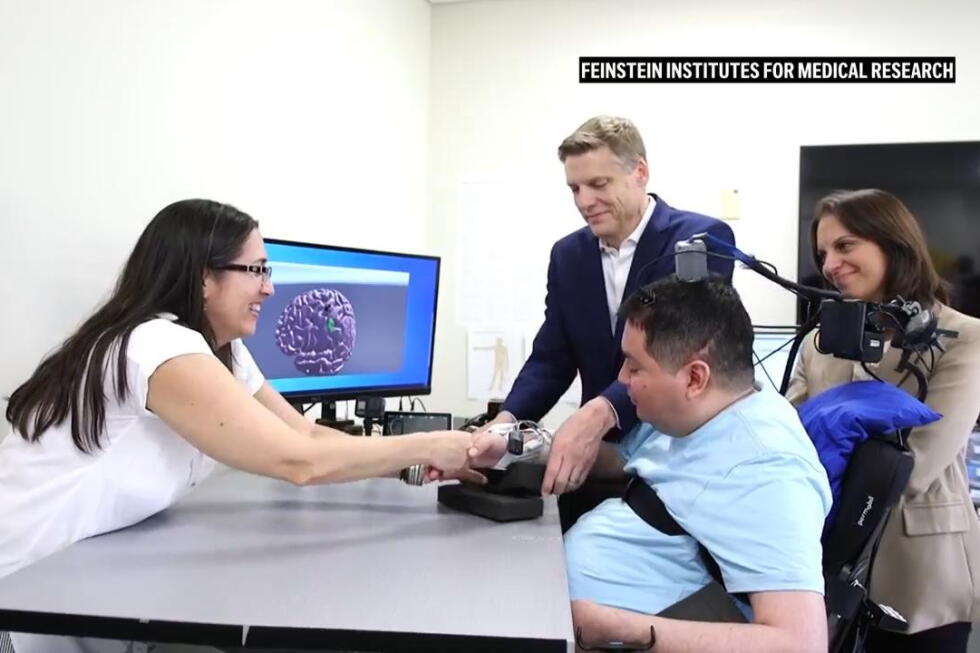 Partial touch and movement returns to paralysed man following brain implant - AP News