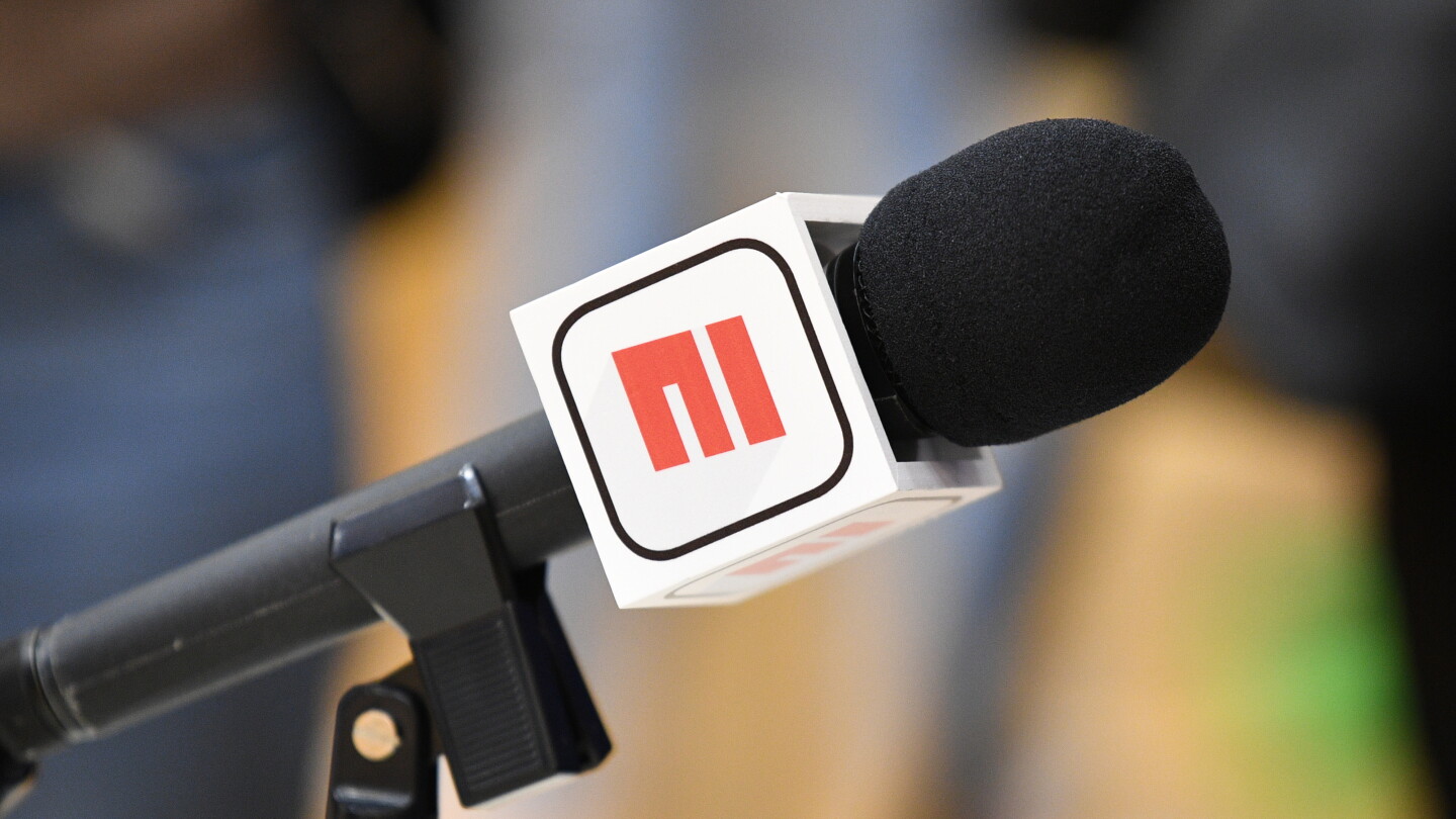 ESPN ties layoffs to NFL Network acquisition