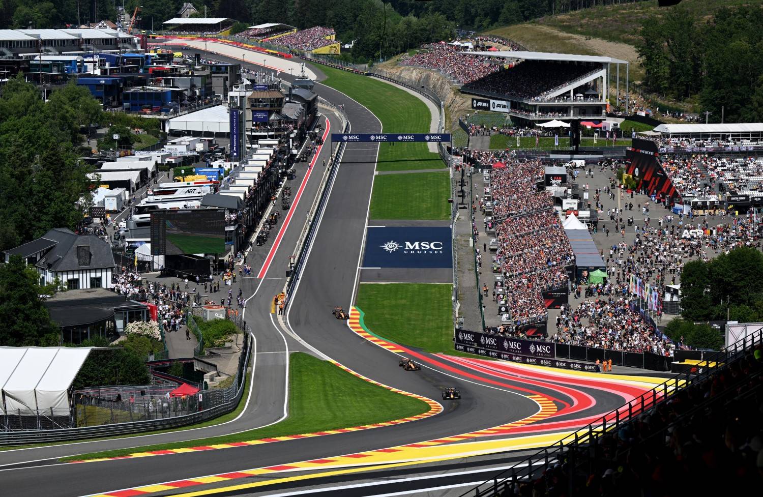 Max Verstappen of the Netherlands driving the (1) Oracle Red Bull Racing RB21 leads Oscar Piastri of Australia driving the (81) McLaren MCL39 Mercedes and Lando Norris of Great Britain driving the (4) McLaren MCL39 Mercedes on track during the Sprint ahead of the F1 Grand Prix of Belgium at Circuit de Spa-Francorchamps on July 26, 2025 in Spa, Belgium. (Photo by Sam Bagnall/Sutton Images) // Getty Images / Red Bull Content Pool //