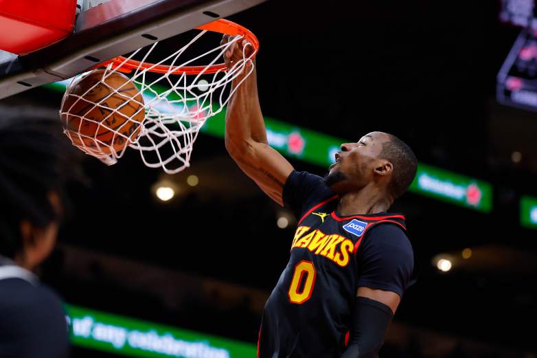 Atlanta Hawks forward Jonathan Kuminga dunks during an NBA game.
