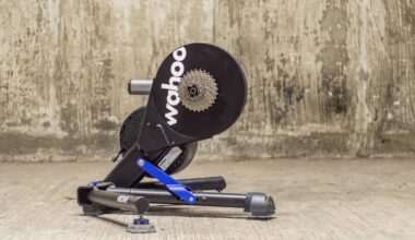 Side angle of Wahoo Kickr V6 outdoors in front of a wall