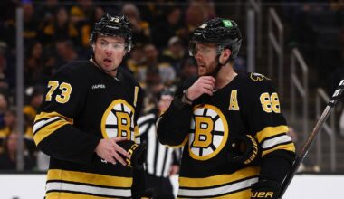 Mar 24, 2026; Boston, Massachusetts, USA; Boston Bruins defenseman Charlie McAvoy (73) talks with right wing David Pastrnak (88) during the third period against the Toronto Maple Leafs at TD Garden. Mandatory Credit: Winslow Townson-Imagn Images