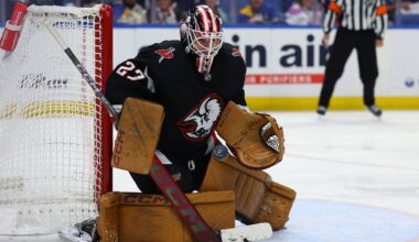 Nov 1, 2024; Buffalo, New York, USA;  Buffalo Sabres goaltender Devon Levi (27) makes a save during the third period against the New York Islanders at KeyBank Center. Mandatory Credit: Timothy T. Ludwig-Imagn Images