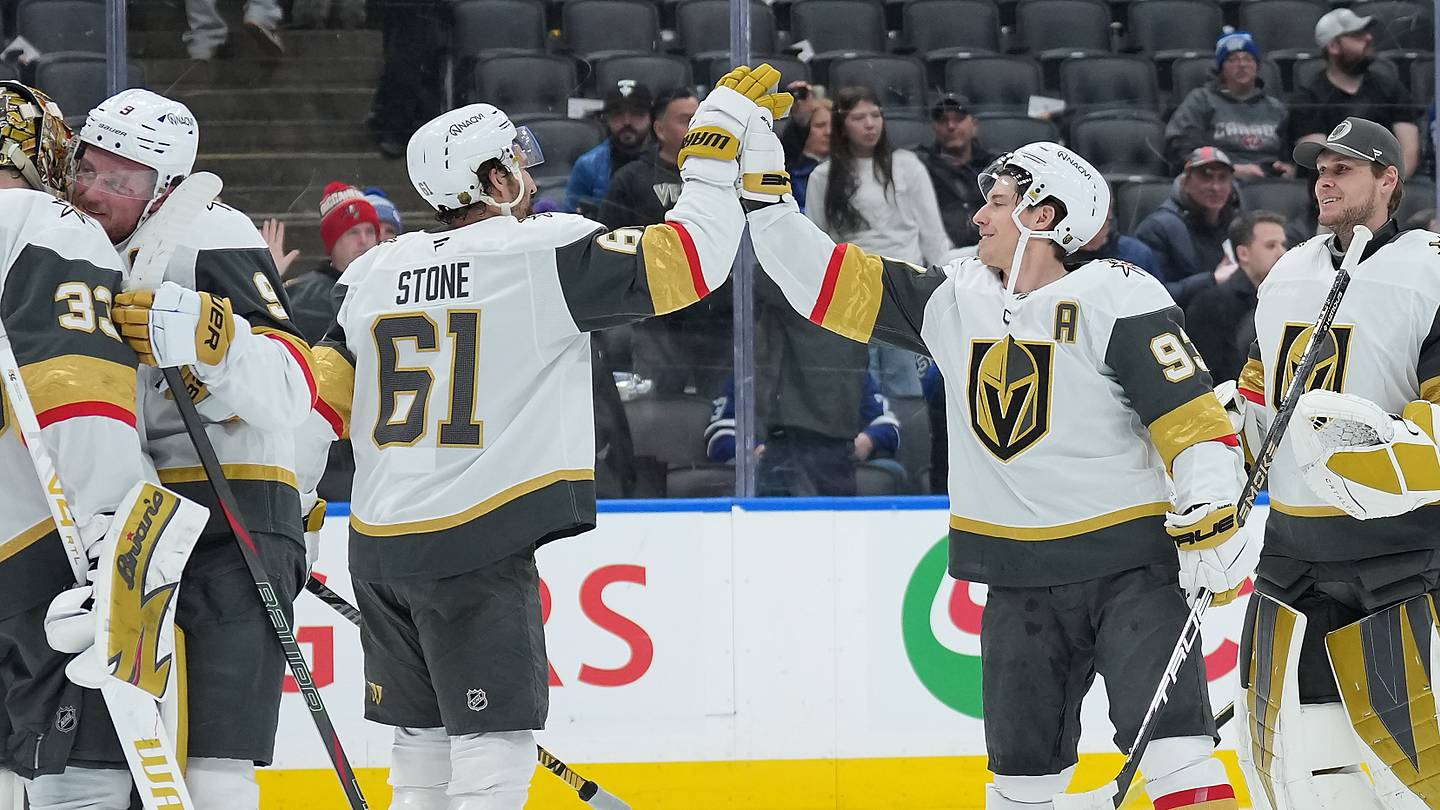 Jan 23, 2026; Toronto, Ontario, CAN; Vegas Golden Knights right wing Mitch Marner (93) celebrates the win against the Toronto Maple Leafs with right wing Mark Stone (61) at the end of the third period at Scotiabank Arena. Mandatory Credit: Nick Turchiaro-Imagn Images