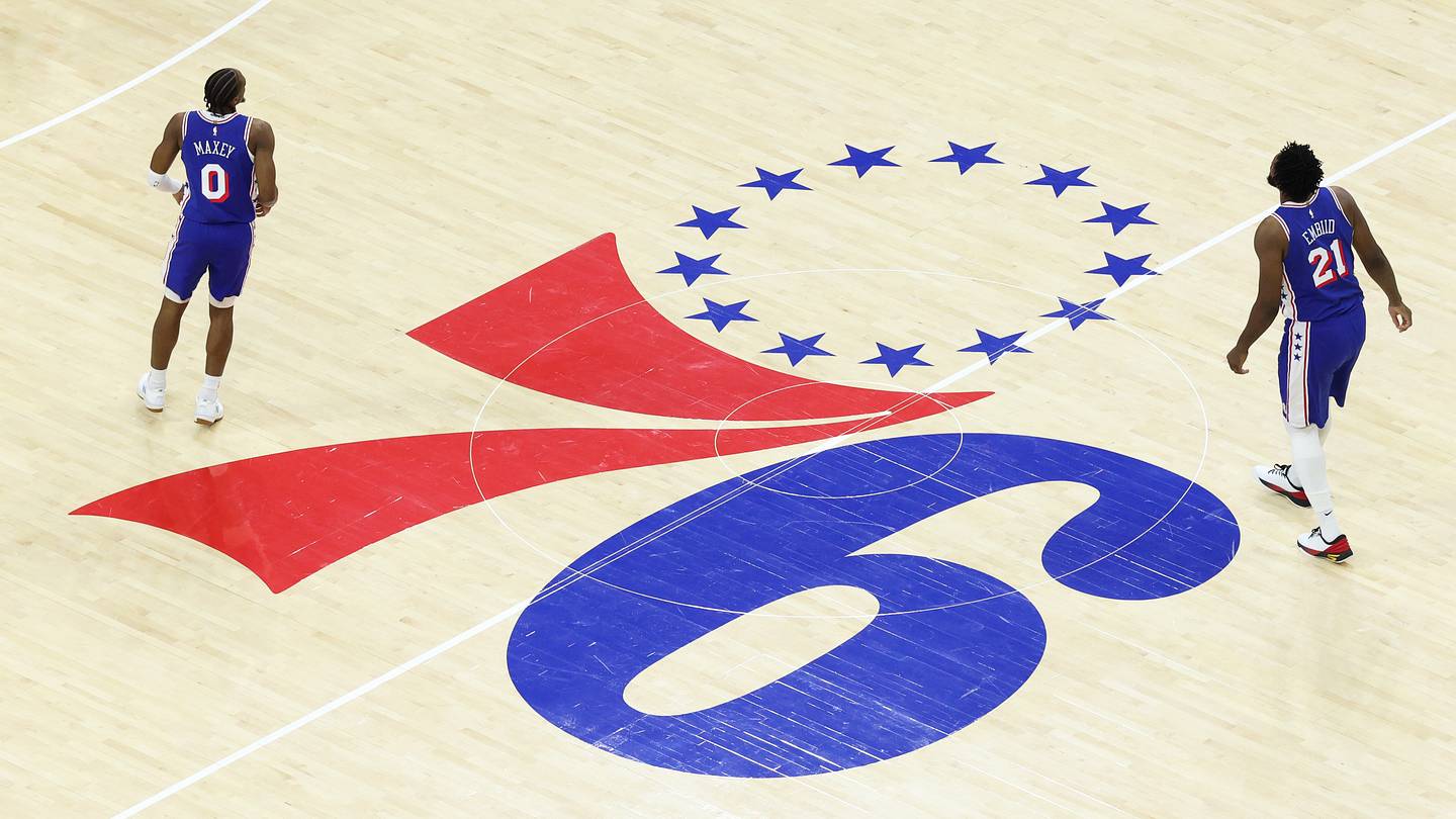 Philadelphia 76ers center Joel Embiid (21) and guard Tyrese Maxey (0) during the first quarter against the Washington Wizards at Xfinity Mobile Arena.