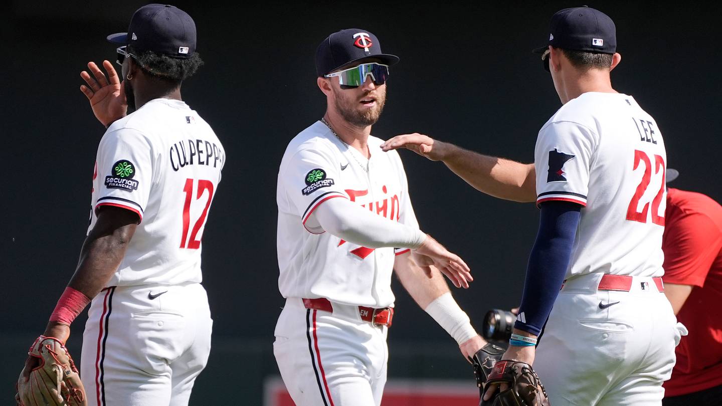 Aug 19, 2026; Minneapolis, Minnesota, USA; Minnesota Twins second baseman Kody Clemens (2) celebrates the win over the Atlanta Braves after game at Target Field. Mandatory Credit: Bruce Kluckhohn-Imagn Images