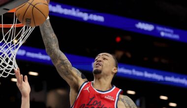 Jan 9, 2026; Brooklyn, New York, USA; Los Angeles Clippers forward John Collins (20) blocks a shot by Brooklyn Nets forward Michael Porter Jr. (17) during the third quarter at Barclays Center. Mandatory Credit: Brad Penner-Imagn Images